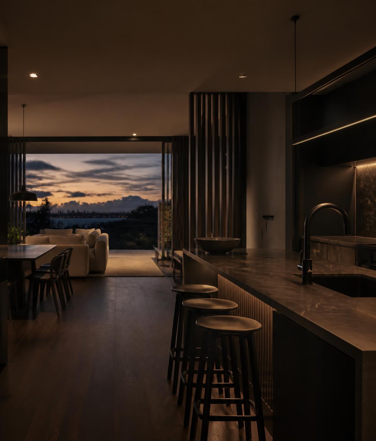 Modern Sydney home interior at dusk with warm architectural lighting